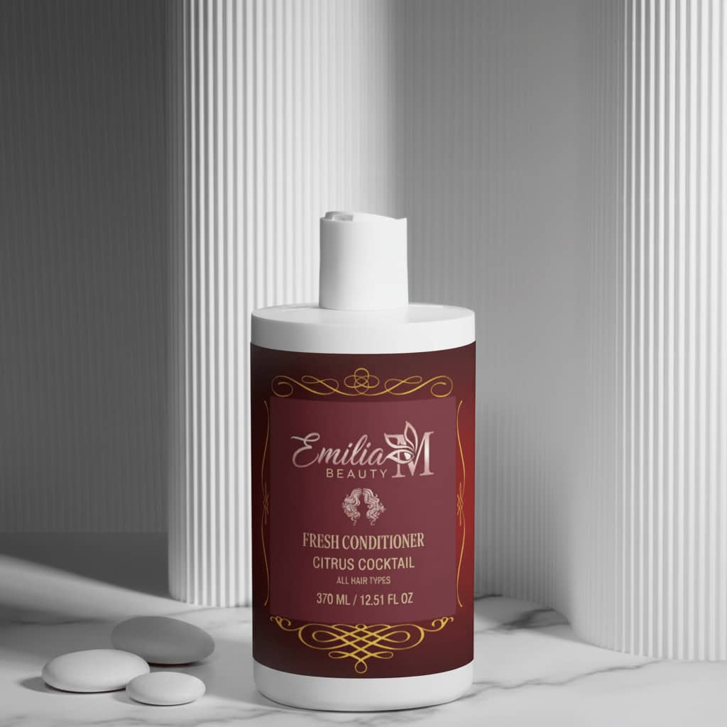 Emilia M Beauty Fresh Conditioner Citrus Cocktail 370ml on white marble surface with spa stones