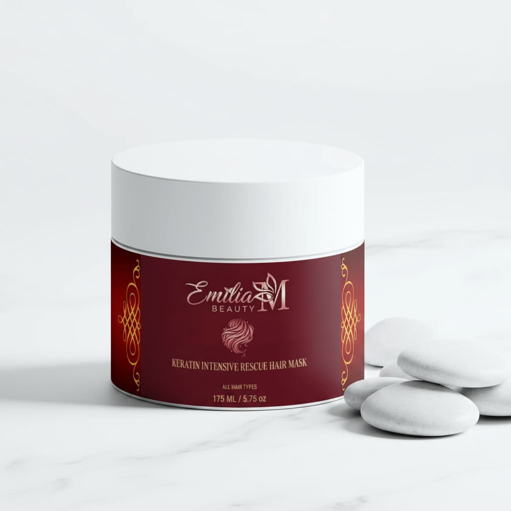Emilia M Beauty Keratin Intensive Rescue Hair Mask 175ml on white marble surface with spa stones, all hair types