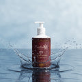 Emilia M Beauty Moisturising Shampoo 290ml with water droplets and blue hydration background, all hair types