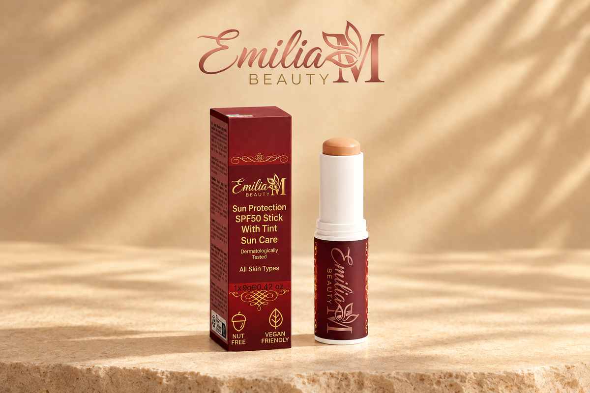 Emilia M Beauty Sun Protection SPF50 Stick With Tint displayed with its burgundy box against a warm beige background