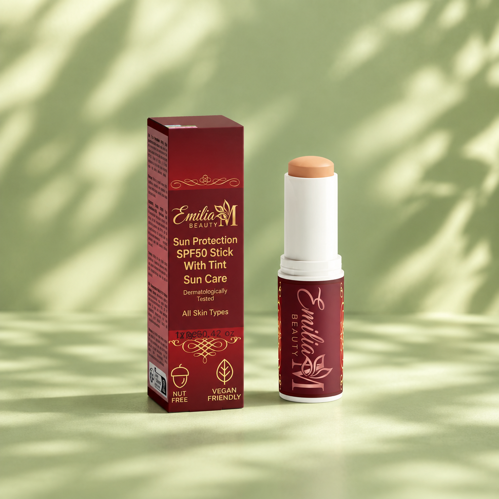 Emilia M Beauty SPF50 Tinted Mineral Sunscreen Stick against a natural green background